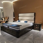 Soft Upholstered Bed with Embossed Brand Mark, Rich-Patterned Natural Wood Veneer Trim & Polished Gold Stainless Steel Accents